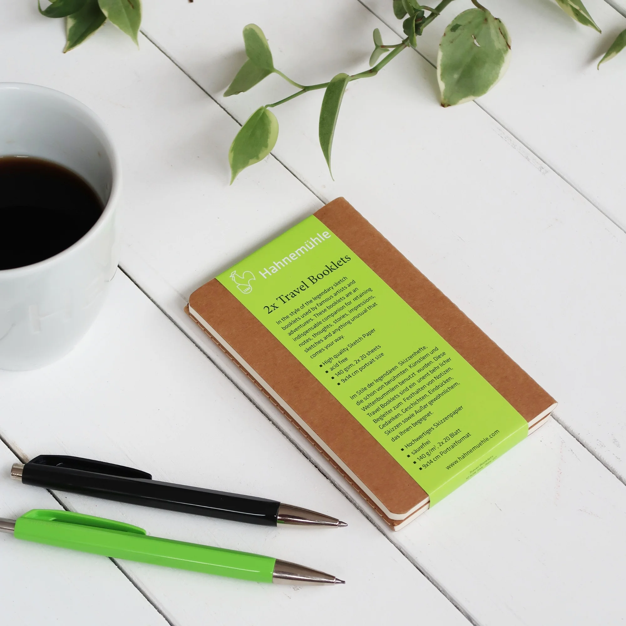 travel notebook, notebook, paper, brown cardboard, green label
