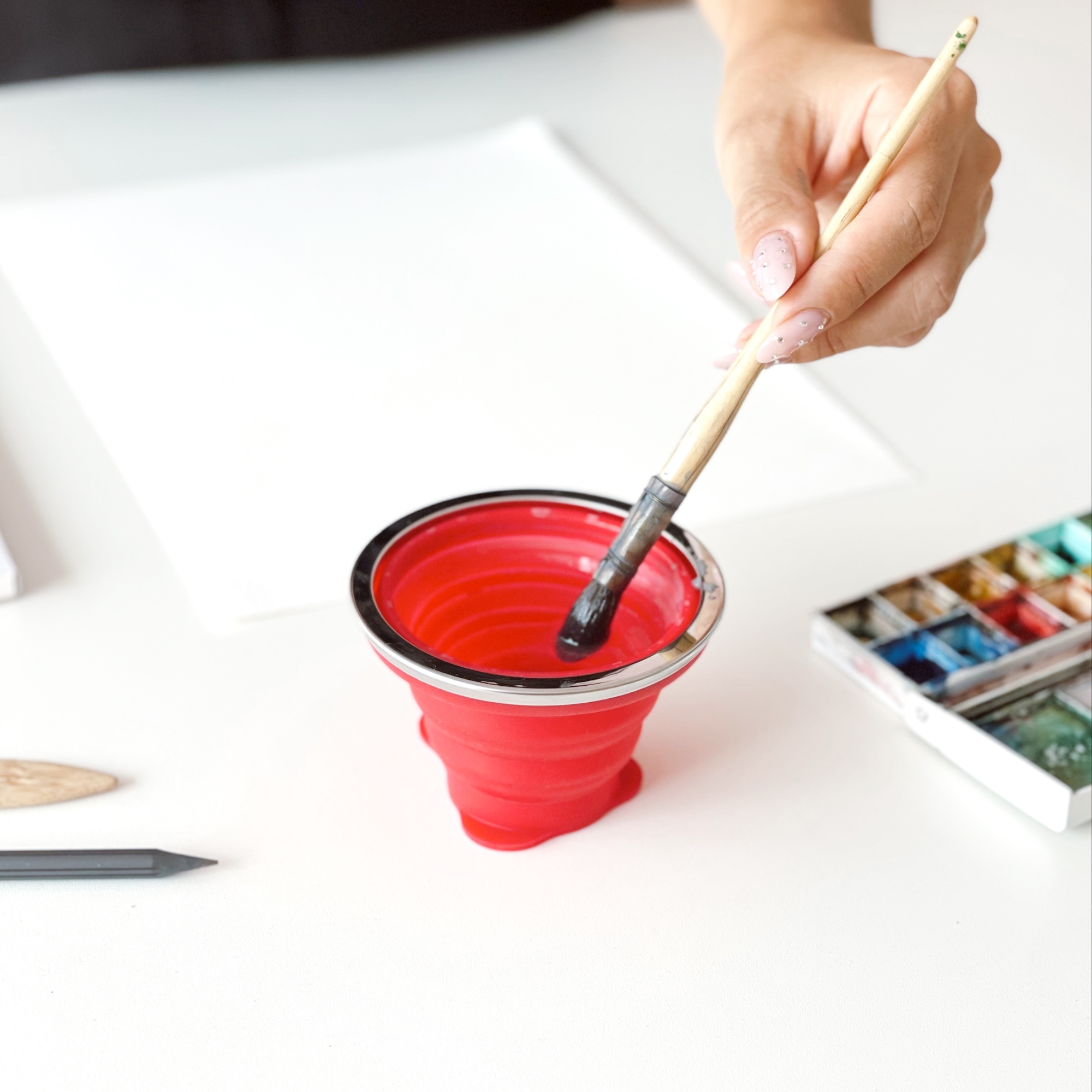 water cup, painting cup in action