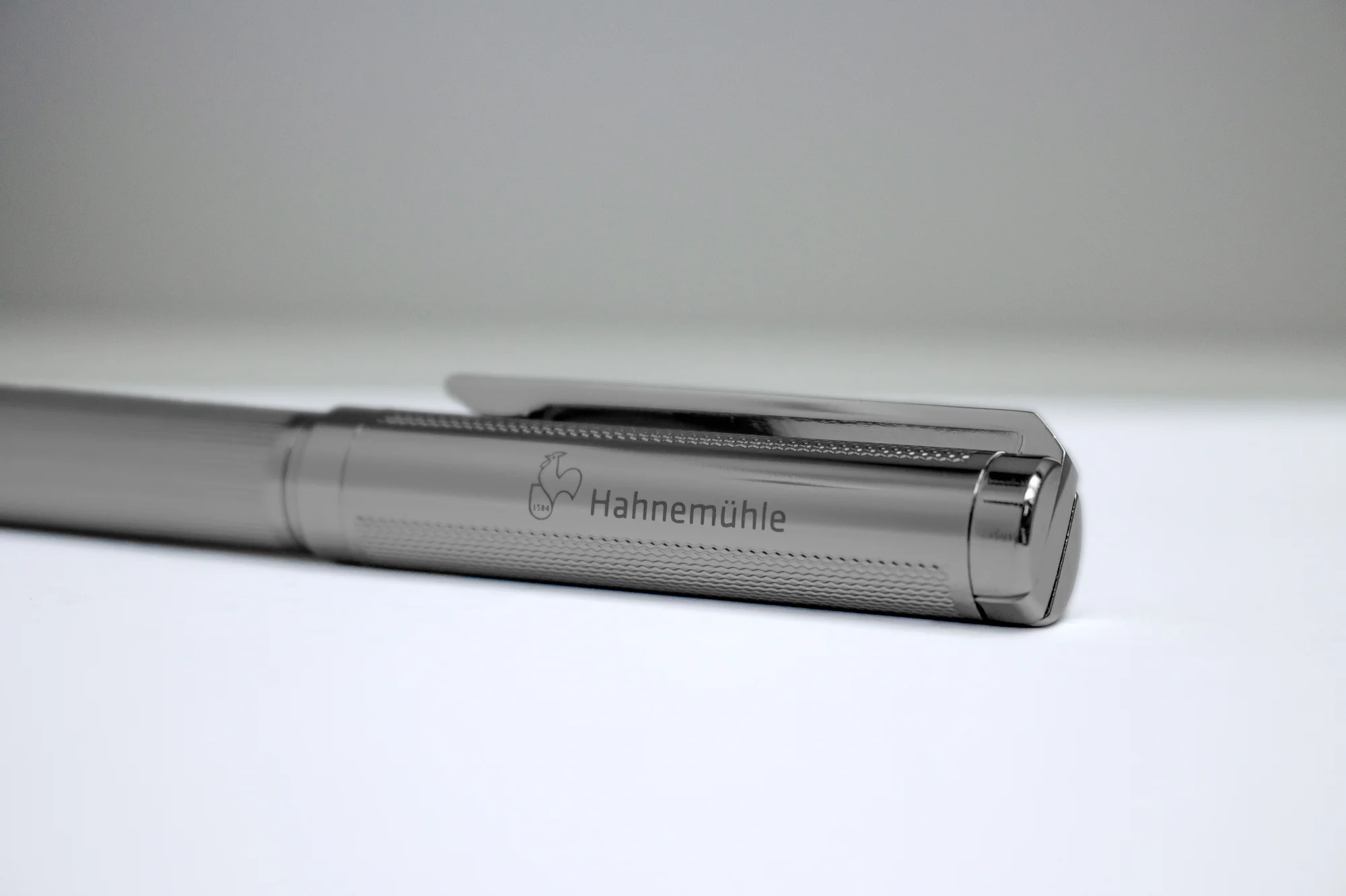 pen, fountain pen, metal, silver, brand not visible