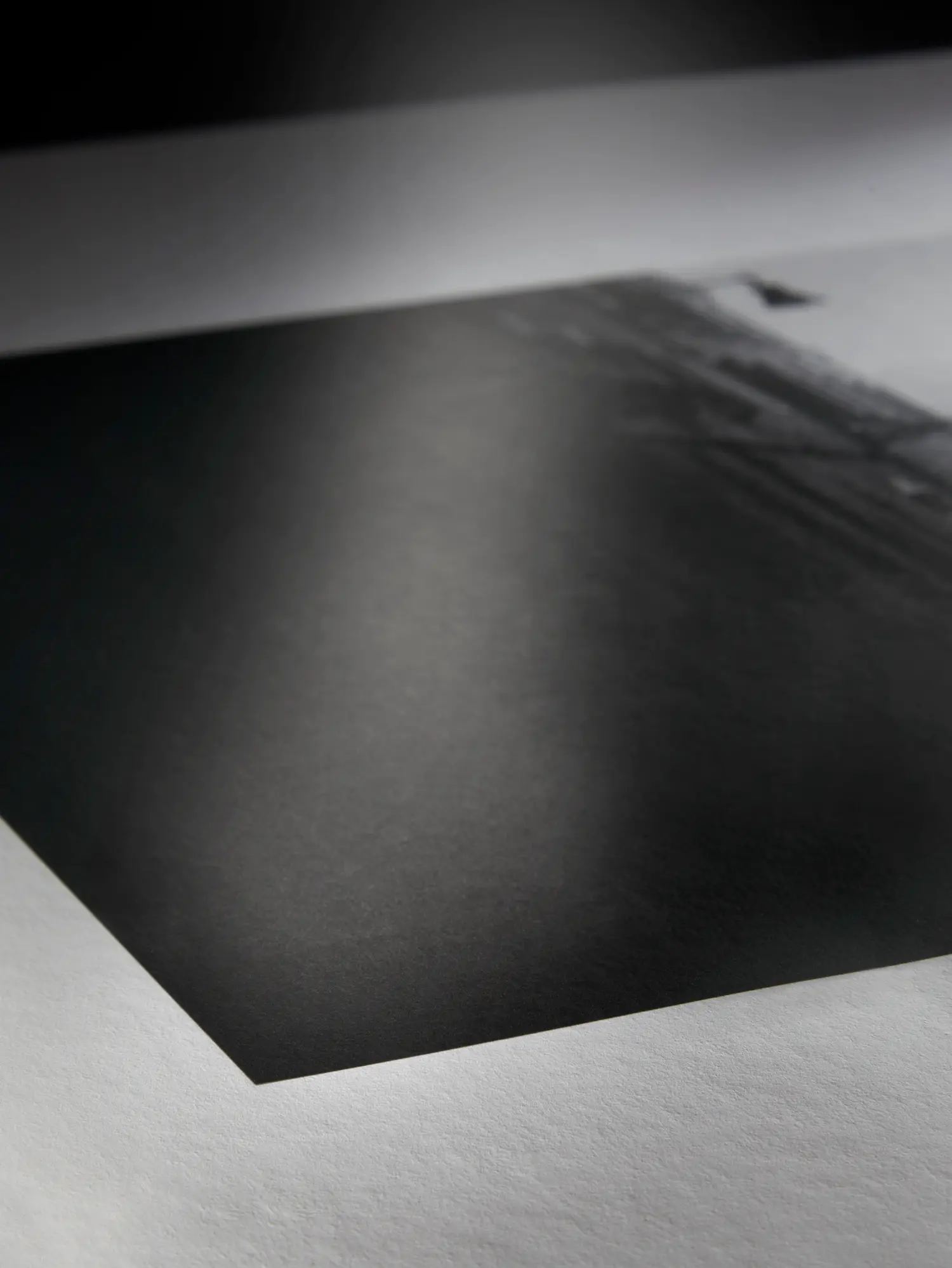 photography, black and white, paper, sheet, staged lighting