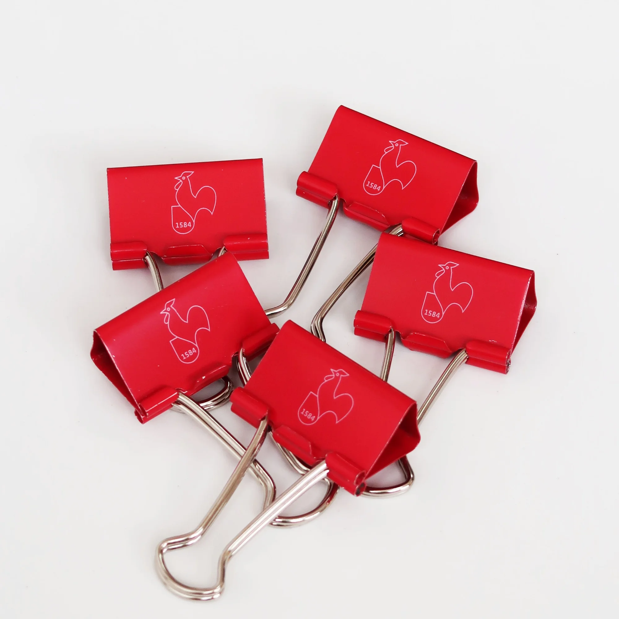 binder clips, red clips, paper clips, metal clips, office supplies